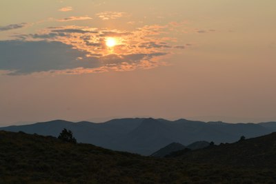 silhouette of mountains during sunset